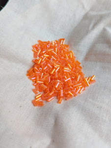 2.7mm Sunset Orange Bugle Beads 12g